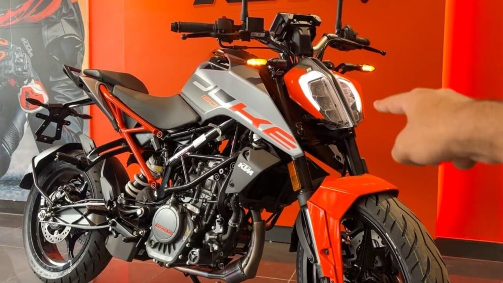 KTM 160 Duke, KTM bike, streetfighter bike, naked sports bike, KTM Duke, powerful bike, sporty bike, 160cc bike, fuel-injected bike, lightweight bike, aggressive design, LED headlamp, digital console, KTM India, performance bike, city ride bike, youth bike, orange bike